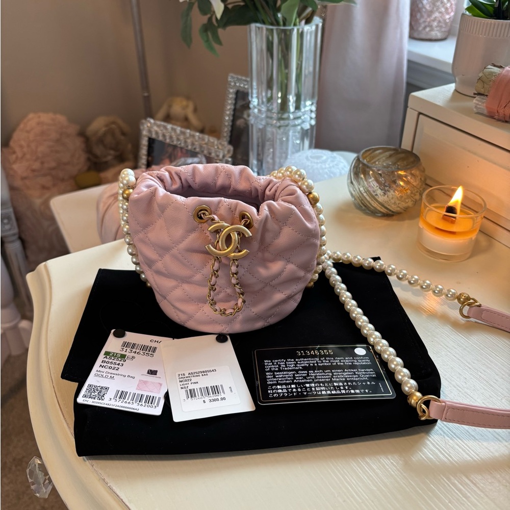 CHANEL Light Pink Quilted Mini Drawstring Bag with Pearl Chain. Never Used. - Picture 9 of 16